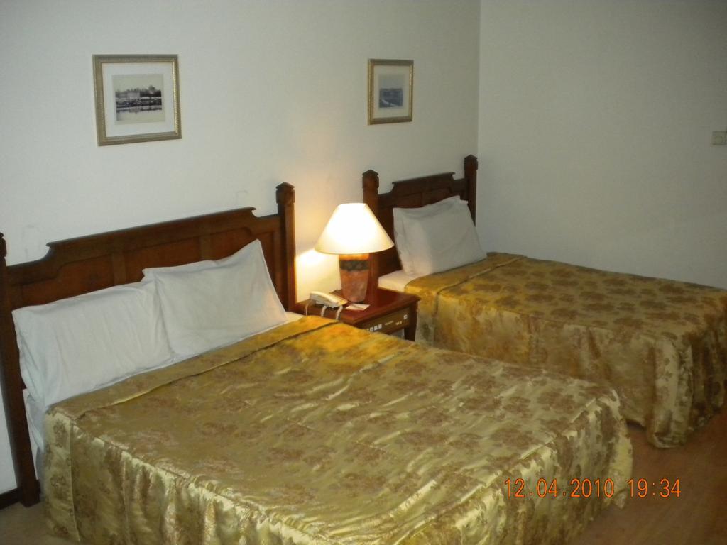Regal Court Hotel קוצ'ינג חדר תמונה